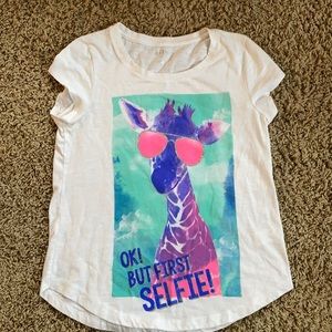 Girl’s cute giraffe shirt